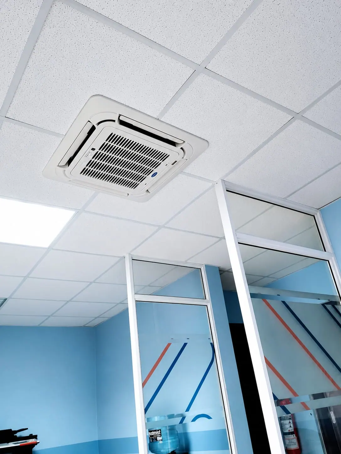 Ceiling cassette air conditioner installed in a commercial office